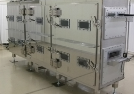 ロール搬送式真空加熱乾燥炉装置